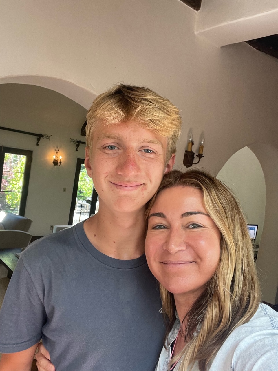 happy mom as her son has returned.