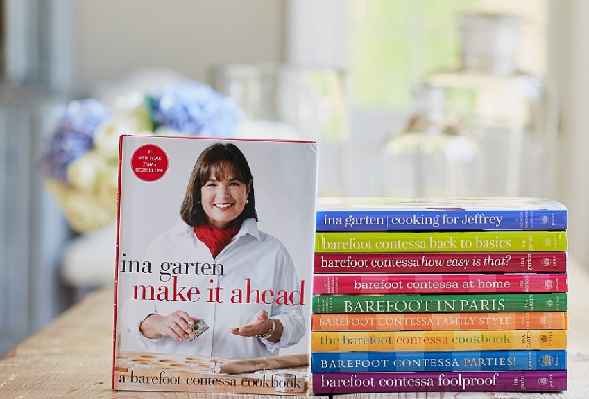 Ina Garten's Make It Ahead cookbook with a stack of her cookbook's to the right. barefoot contessa stack of cookbooks