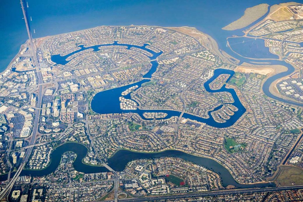 view of Foster City from an airplane. shows the lagoon and the San Francisco Bay from 30,000 feet.